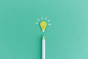 Pencil with light bulb above