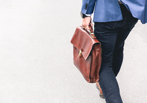 man walking with a suitcase