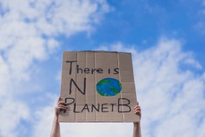 Close-up of sign at protest reading "There is no Planet B".