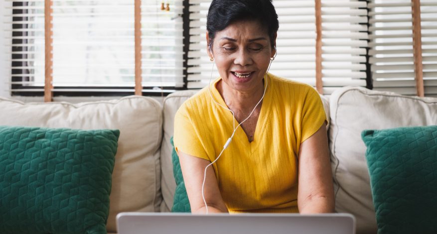 Woman on video call on laptop.