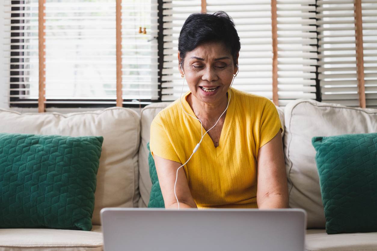 Woman on video call on laptop.