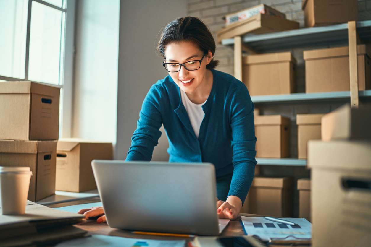 Woman is working at warehouse for online seller