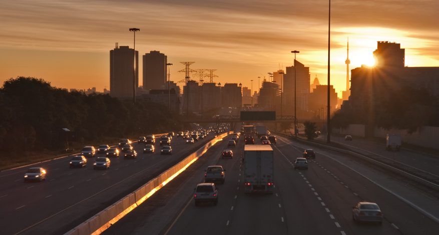 Sun rising over Toronto cityscape