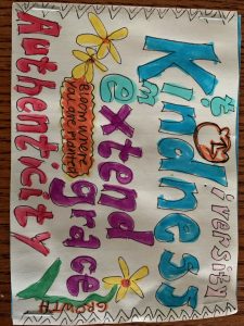 Paper with hand-drawn lettering: Diversty, Kindness, extend grace, Authenticity